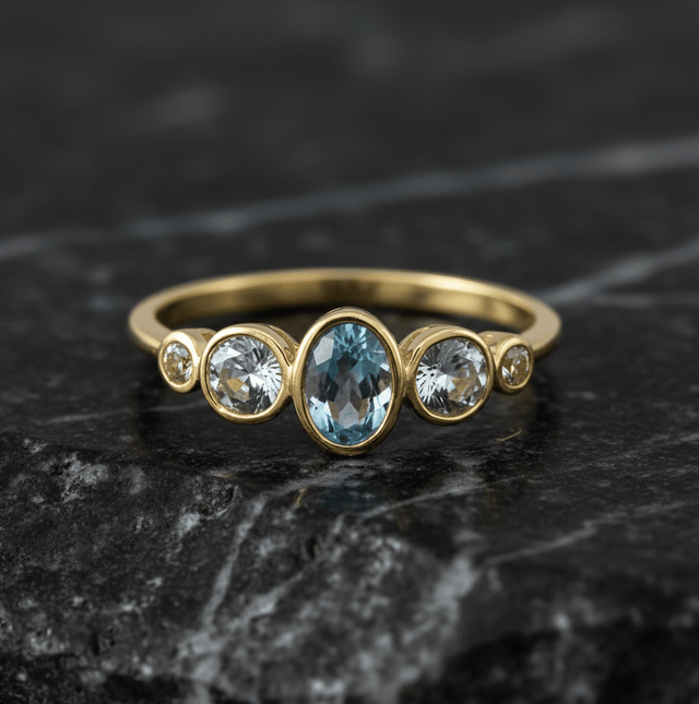 Ring 375 Gelbgold mit Blautopas/Weißtopas 052 (16,6) - Avrum